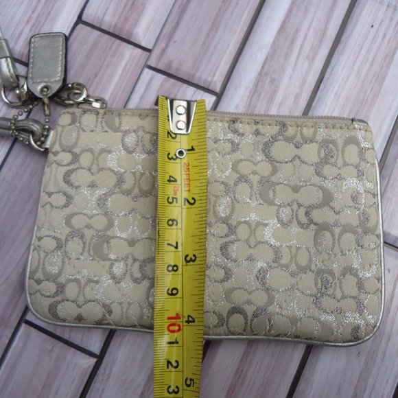 Coach wristlet with classic signature print canvas. - Picture 13 of 16